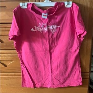 Pink UConn Nike shirt